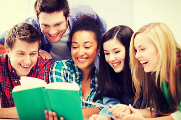 Image showing students reading book at school