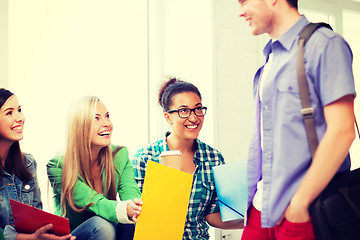 Image showing students communicating and laughing at school