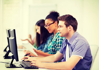 Image showing students with computers studying at school