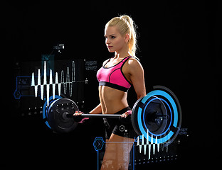 Image showing sporty woman exercising with barbell