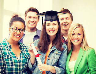 Image showing girl in graduation cap with certificate