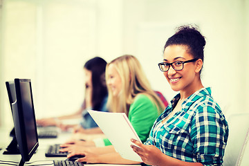 Image showing african student with computer studying at school