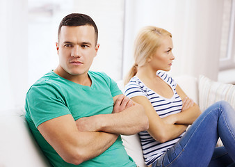 Image showing unhappy couple having argument at home