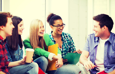 Image showing students communicating and laughing at school