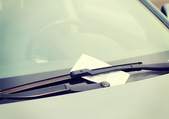 Image showing parking ticket on car windscreen