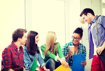 Image showing students communicating and laughing at school