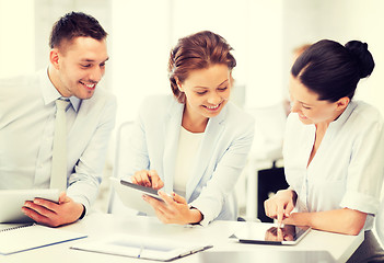 Image showing business team working with tablet pcs in office