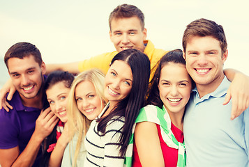 Image showing group of friends having fun on the beach