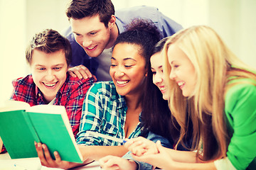 Image showing students reading book at school