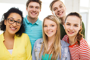 Image showing group of smiling people at school or home