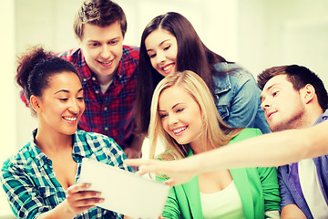 Image showing students looking at tablet pc at school