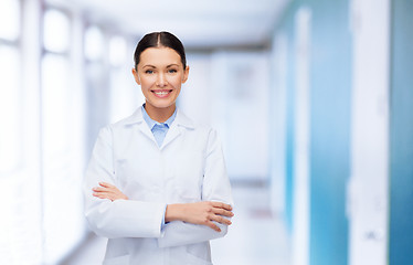 Image showing female doctor with crossed arms at hospital