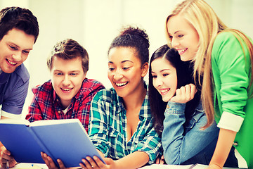 Image showing students reading book at school