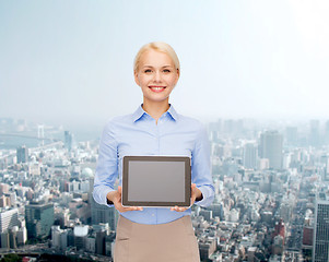 Image showing businesswoman with blank black tablet pc screen