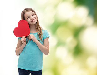 Image showing smiling little girl with red heart