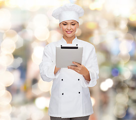 Image showing smiling female chef with tablet pc computer