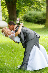 Image showing beautiful young wedding couple kissing