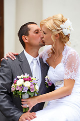 Image showing beautiful young wedding couple kissing