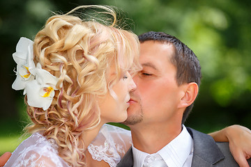 Image showing beautiful young wedding couple kissing