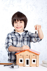 Image showing Boy offers the keys