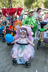 Image showing Participants of the contest of babyish strollers