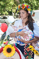 Image showing Participants of the contest of babyish strollers