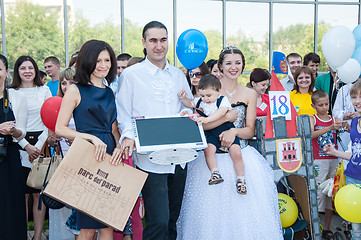 Image showing Participants of the contest of babyish strollers