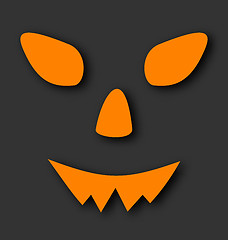 Image showing Jack o lantern pumpkin faces glowing on black background