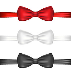 Image showing Set realistic red, white and black bow ties, isolated on white b