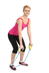 Image showing Back extension exercise using rubber resistance band