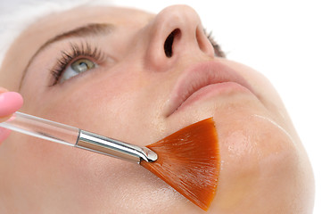 Image showing facial peeling mask applying