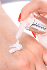 Image showing hands skin care - cream applying