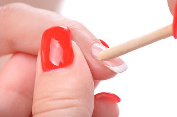 Image showing manicure applying - cleaning the cuticles 