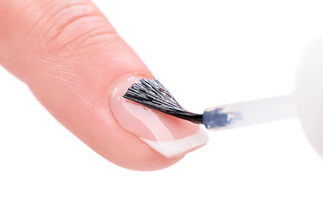 Image showing manicure, applying clear enamel