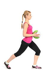 Image showing Girl doing lunges exercise with medicine ball 