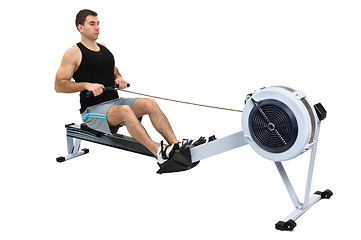 Image showing man doing indoor rowing