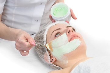 Image showing beauty salon, facial mask applying