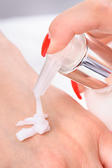 Image showing hands skin care - cream applying