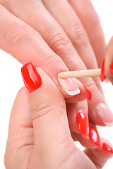 Image showing manicure applying - cleaning the cuticles 