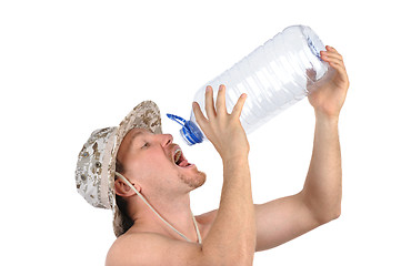 Image showing young man drinks from empty bottle