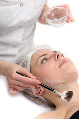 Image showing beauty salon, facial mask applying