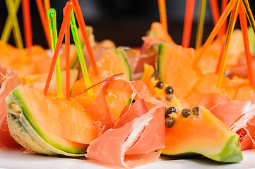 Image showing salad with prosciutto and papaya