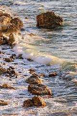 Image showing Sea tide in rays of sunset