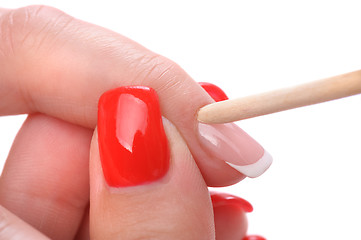 Image showing manicure applying - cleaning the cuticles 