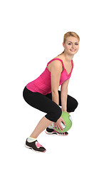 Image showing Female throwing medicine ball exercise  phase 1 of 2