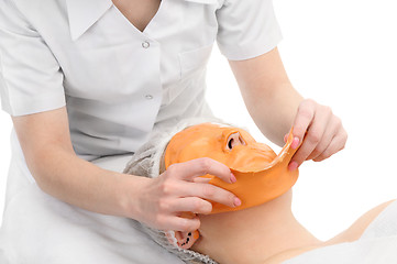 Image showing Removing alginate peel-off facial mask