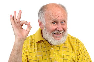 Image showing senior bald man's gestures