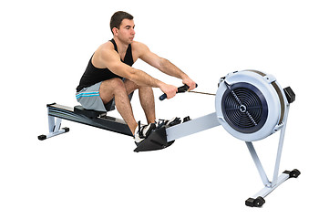 Image showing man doing indoor rowing