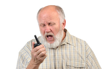 Image showing senior bald man talking using walkie-talkie