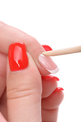 Image showing manicure applying - cleaning the cuticles 